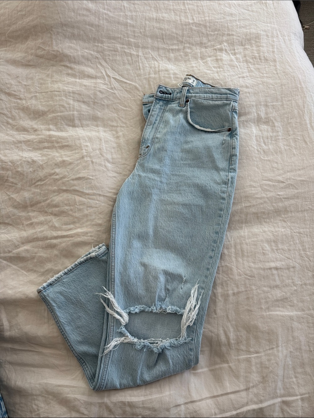 Light Blue Distressed Womenās Jeans
